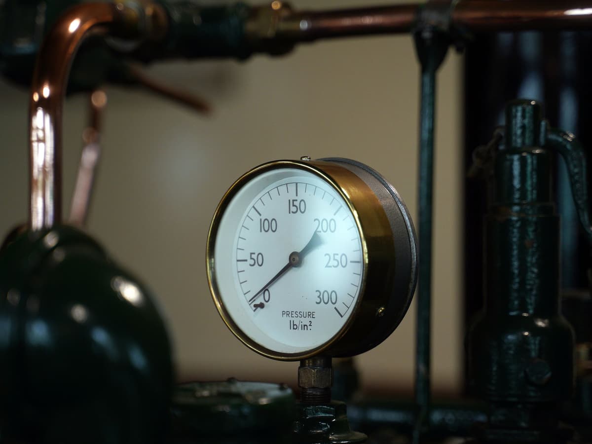 Technician servicing a boiler before the rainy season