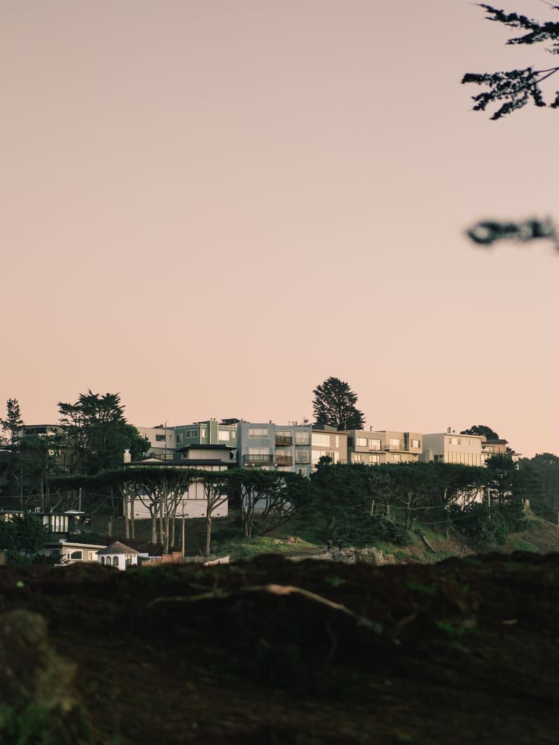 West Coast modern post-and-beam home among fir trees